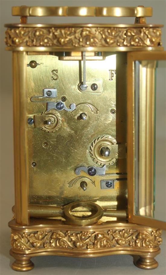 An early 20th century French gilt brass carriage alarm clock, 5.25in.